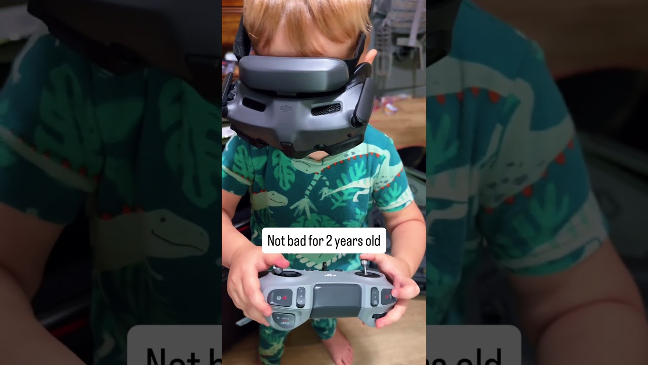 Teaching him how to fly the FPV Drone at 2 years old. #dji #fpv #photography #fyp #drone